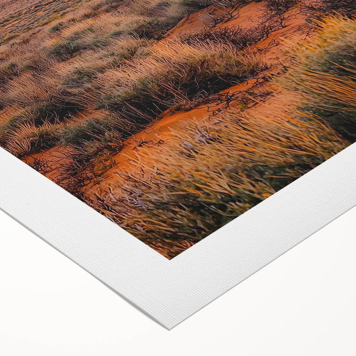 Vibrant rolled canvas showcasing a stunning desert dune landscape at sunset, featuring warm hues of orange and gold, perfect for enhancing home decor aesthetics.