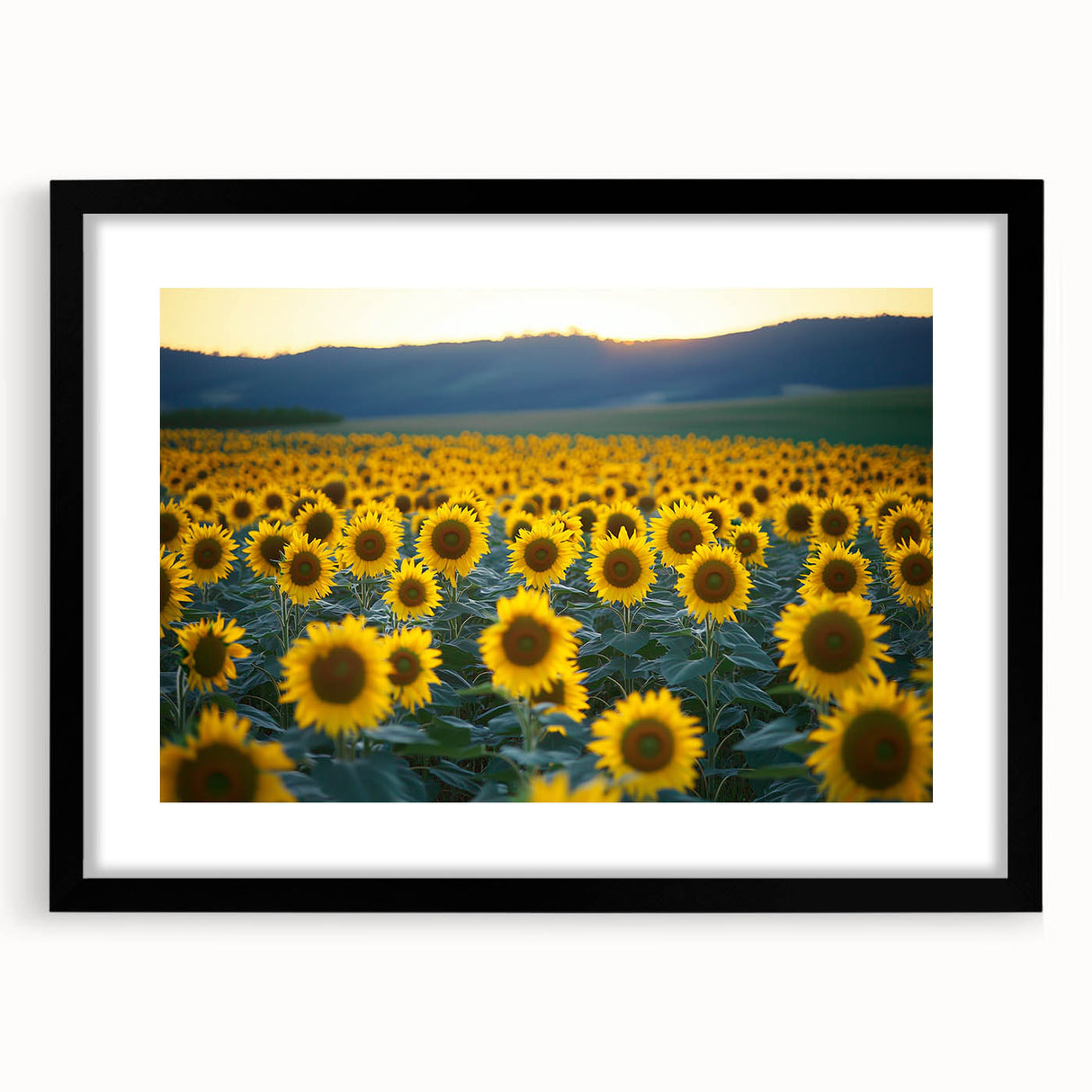 Framed landscape artwork showcasing vibrant green fields under a clear blue sky, with a sleek black mat and frame, perfect for home decor enhancement.