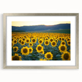 Framed silver landscape art print featuring vibrant green fields under a clear blue sky, highlighted with a white mat, perfect for home décor.