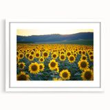 Framed landscape artwork featuring vibrant green fields and blue skies, elegantly matted in white and displayed from a front view, perfect for home decor.