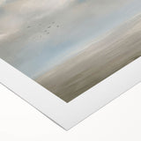 Vibrant rolled canvas depicting a serene landscape scene with green hills and a blue sky, expertly packaged in a protective cardboard tube for shipping.