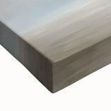 Close-up of a stretched canvas displaying vibrant abstract landscape artwork with rich colors and intricate textures, ideal for modern home decor.