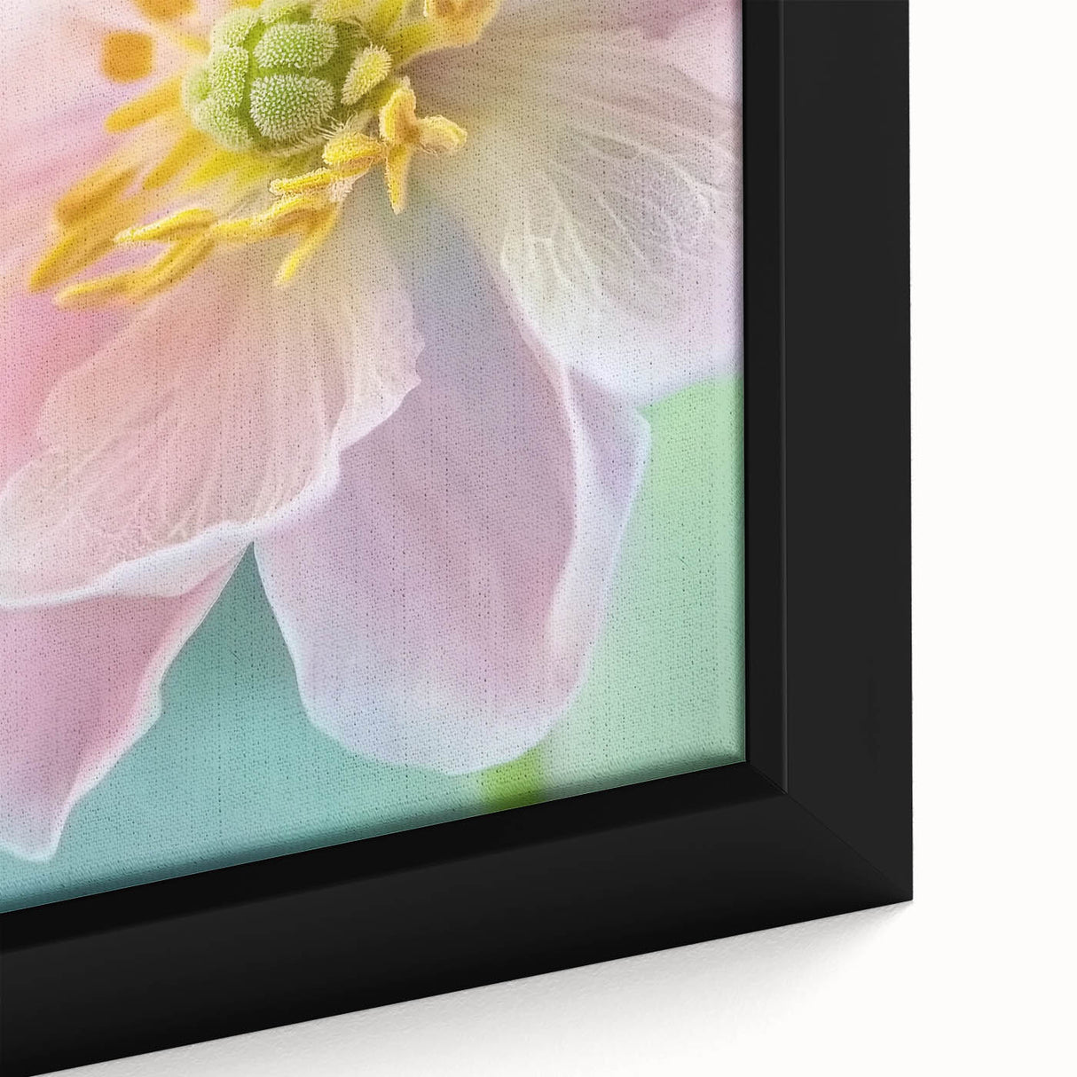 Close-up of black framed canvas featuring a textured, colorful floral design, ideal for extra large living room wall art.