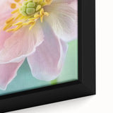 Close-up of black framed canvas featuring a textured, colorful floral design, ideal for extra large living room wall art.