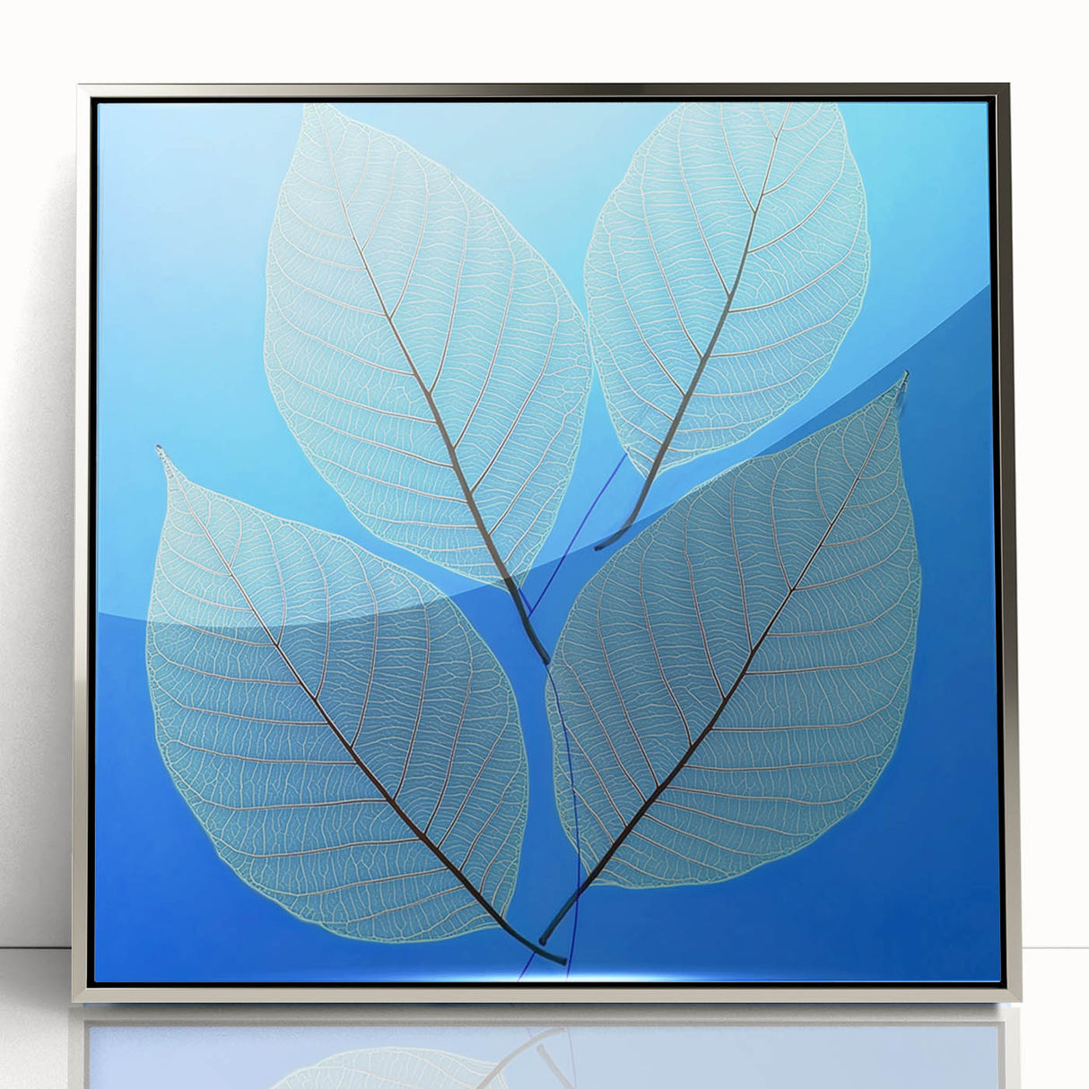 Mid-century modernist art featuring close-up of green leaves, in a silver framed acrylic, ideal for nursery wall decor.