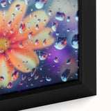 Close-up of a black framed canvas featuring a textured, colorful abstract design, ideal for living room decor.