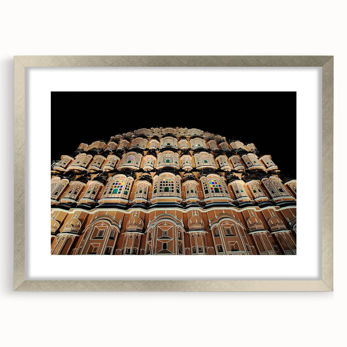 Textured abstract art print of Asian scenery in muted earth tones on a framed silver mat, suitable for bedroom decor.