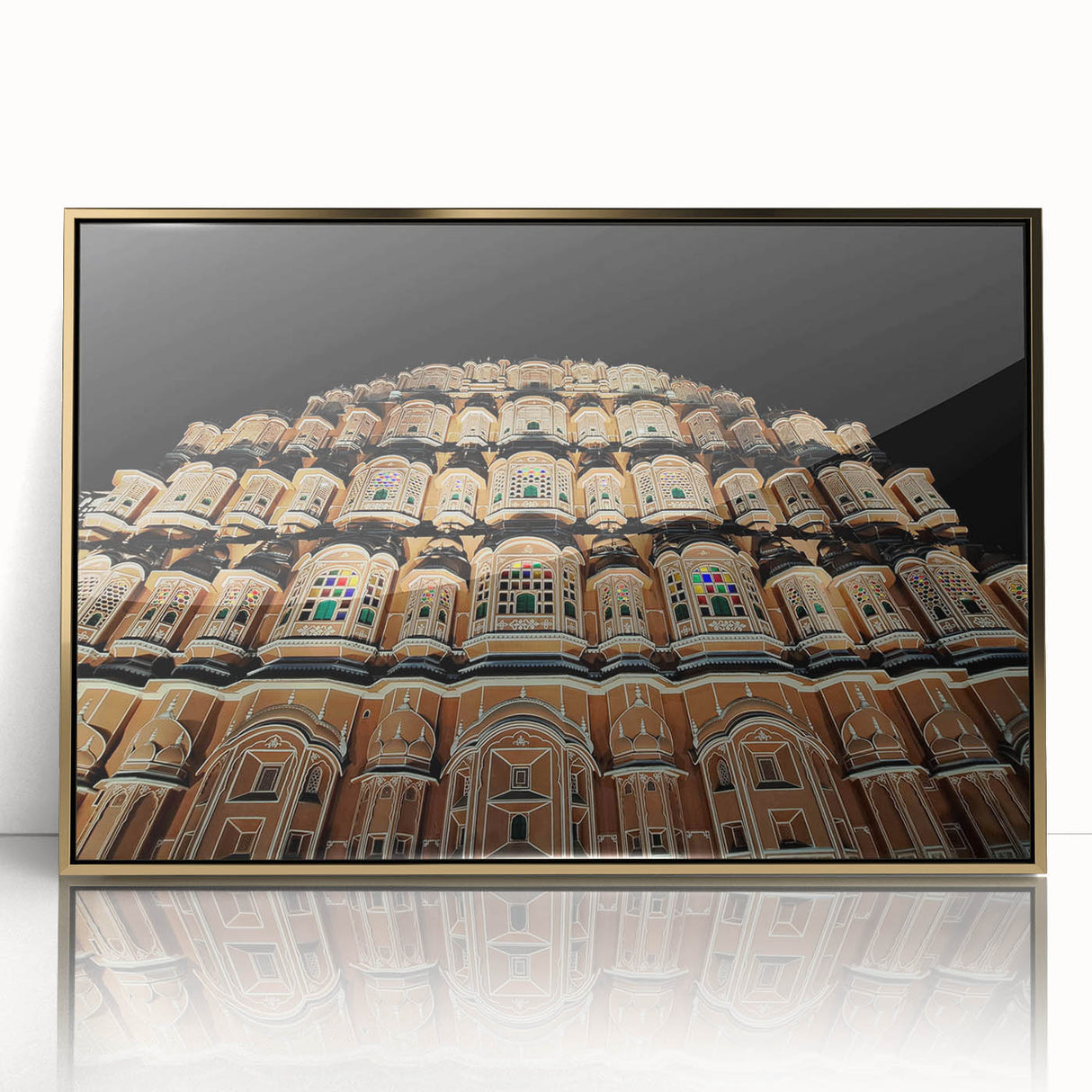 Large art print of a mid-century modernist Indian landscape in gold and earth tones on framed acrylic.