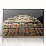 Large art print of a mid-century modernist Indian landscape in gold and earth tones on framed acrylic.