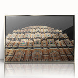 Mid-century modernist art depicting an Indian landscape in muted earth tones on a silver-framed acrylic print.