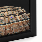 Extra large framed canvas featuring a textured depiction of an Indian scenery in black with colorful accents.