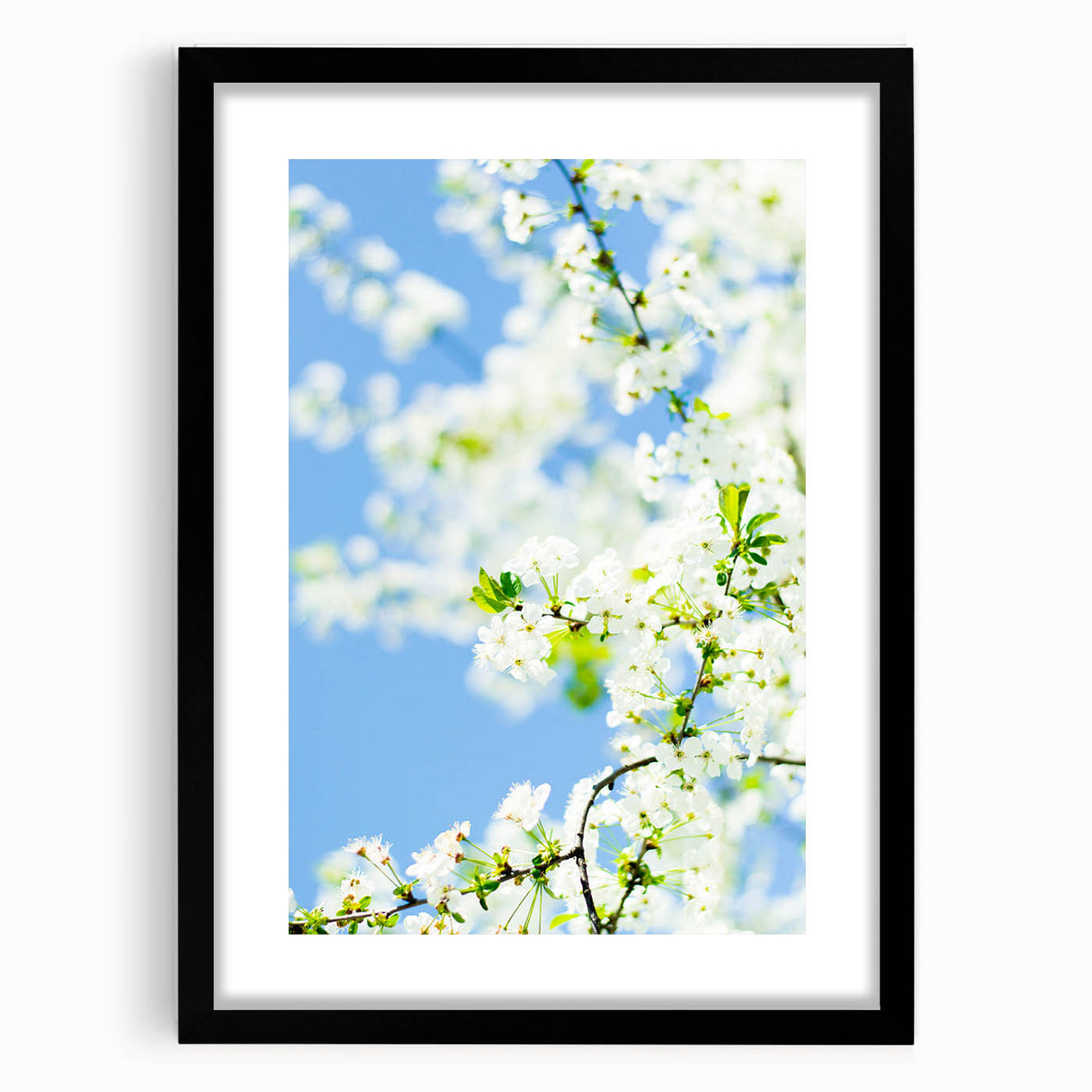 Extra large abstract art print with vibrant spring colors on textured canvas, framed in black, ideal for living room decor.