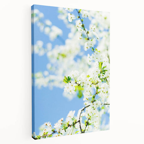 Spring-themed large canvas wall art featuring a blossoming tree with pink flowers and soft green background.