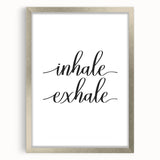 Textured abstract art print in neutral tones on a silver-framed canvas, suitable for bedroom decor.