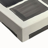 Close-up of a minimalist abstract stretched canvas artwork showcasing soft pastel colors and fluid shapes, ideal for modern home decor and artistic interiors.