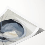 Abstract minimalist art print featuring soft pastel colors and geometric shapes, elegantly rolled and packaged in a protective cardboard tube for easy display.