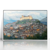 Framed acrylic artwork showcasing a stunning landscape with a majestic castle, set against a vibrant sunset, featuring a white frame that enhances its elegance.