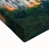 Close-up of a stretched canvas showcasing a vibrant landscape with a majestic castle, featuring rich colors and fine details, ideal for home decor.