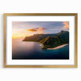 Elegant gold-framed landscape artwork showcasing dramatic cliffs, set against a serene sky, ideal for adding sophistication to home decor.