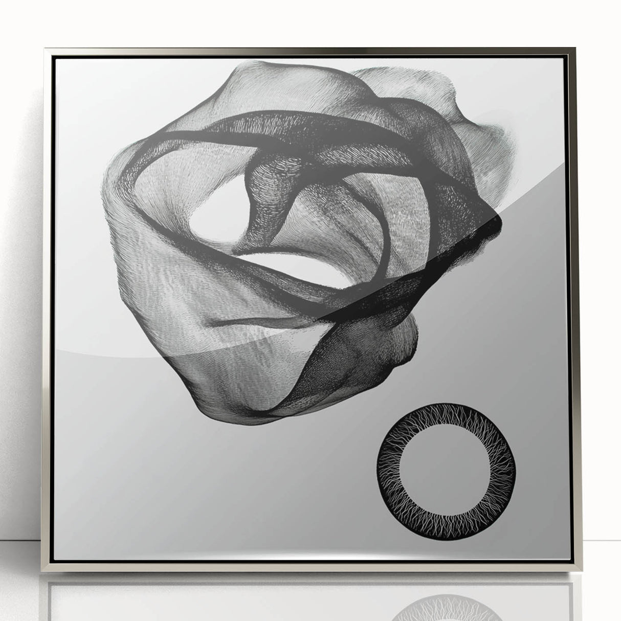 Framed acrylic artwork showcasing a sleek, modern abstract geometric design in silver tones, perfect for contemporary home decor. The piece features sharp angles and layered shapes, enhancing visual intrigue while complementing minimalist interiors.