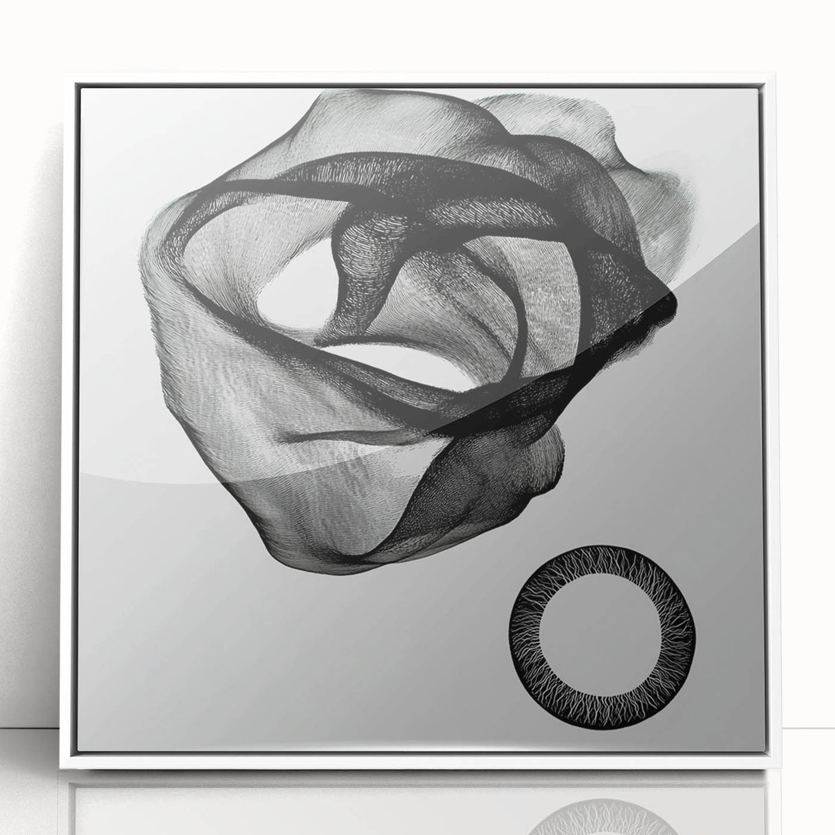 Framed abstract geometric wall art featuring dynamic shapes and a modern design in white and gray tones, perfect for contemporary home decor.