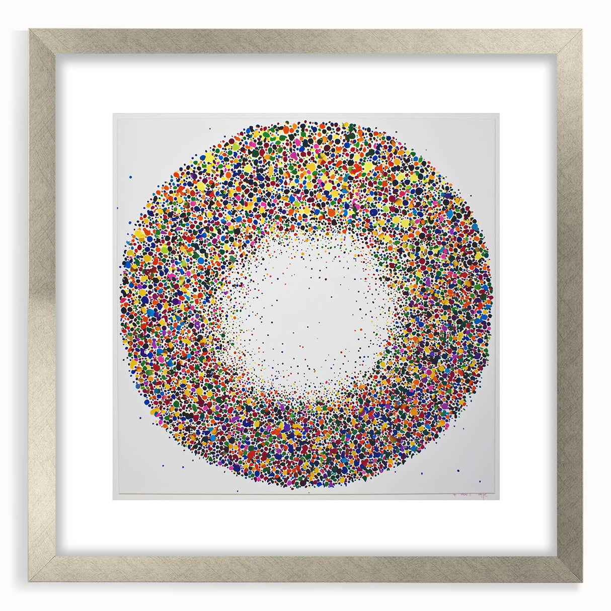 Abstract silver-framed artwork displaying vibrant splatter designs, perfect for modern decor. The mat enhances the colors, making it an eye-catching centerpiece.