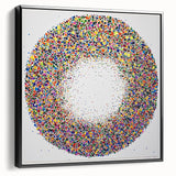 Framed canvas artwork showcasing an abstract splatter design in black, featuring a sleek side view that highlights its modern aesthetic and textured finish.