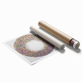 Abstract splatter art print on rolled canvas, showcasing vibrant colors and dynamic patterns, perfect for modern home decor or creative studio spaces.