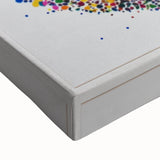 Close-up of a vibrant abstract splatter design on stretched canvas, showcasing rich colors and unique textures ideal for modern home decor or gallery display.