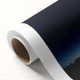 Rolled canvas showcasing a vibrant landscape barn scene with rich colors, securely packaged in a durable cardboard tube for safe shipping and storage.