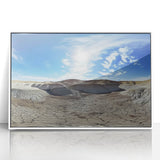 Framed acrylic landscape artwork depicting colorful canyons in vibrant hues of orange and blue, set against a sleek white frame, ideal for modern home decor.