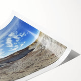 Stunning rolled print showcasing a vibrant landscape of colorful canyons under a clear blue sky, perfect for home décor and art enthusiasts.