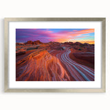 Desert landscape artwork framed with a silver mat, showcasing warm earth tones and intricate details, perfect for enhancing modern home decor.