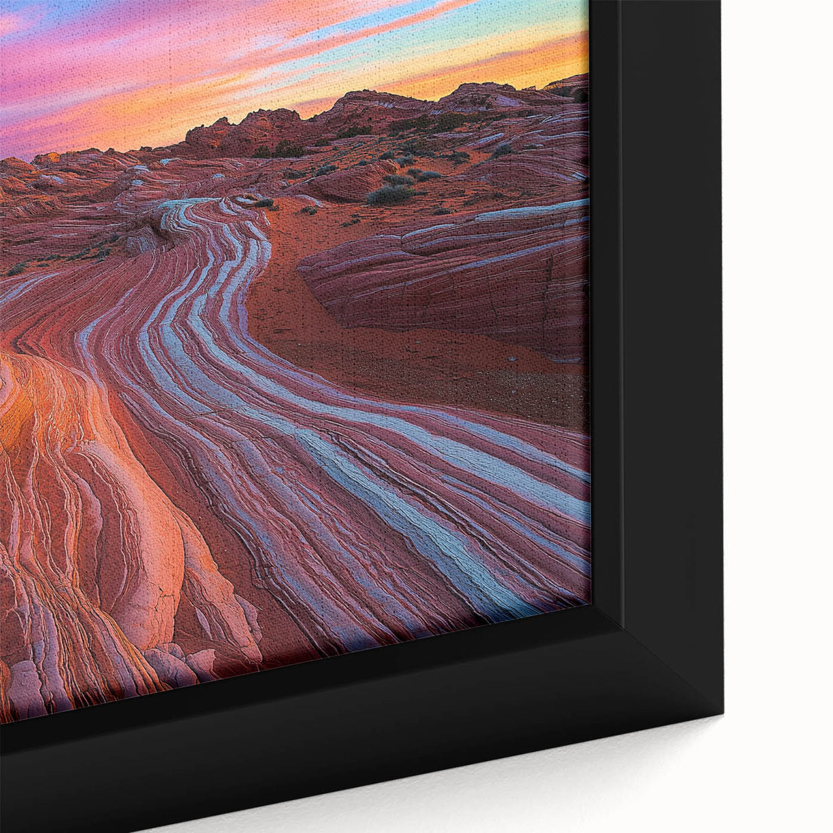 Close-up view of a framed desert landscape canvas art piece showcasing vibrant hues of orange and gold, perfect for enhancing modern home decor with a touch of nature.