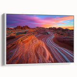 Framed canvas artwork showcasing a stunning desert landscape with vibrant colors and intricate details, elegantly displayed against a white background for a modern aesthetic.