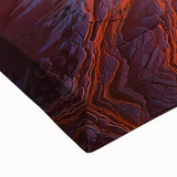 Close-up of a stretched canvas artwork depicting a vibrant desert landscape, showcasing warm earth tones and detailed textures, perfect for home decor.