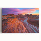 Stretched canvas artwork showcasing a vibrant desert landscape with warm hues of orange and yellow, ideal for home decor or office aesthetics.