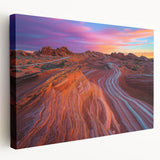 Stretched canvas artwork depicting a serene desert landscape, showcasing vibrant hues of orange and yellow with a textured finish, ideal for home decor.