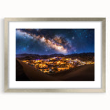 Framed landscape artwork depicting serene sand dunes in soft beige and golden tones, accented with a sleek silver mat, perfect for modern home decor.