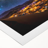 Desert landscape canvas print showcasing vibrant golden sand dunes under a clear blue sky, rolled and ready for display, perfect for modern home decor.
