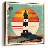 Framed canvas wall art depicting a serene lighthouse landscape at sunset, accented with silver and gold tones, perfect for coastal-themed decor.