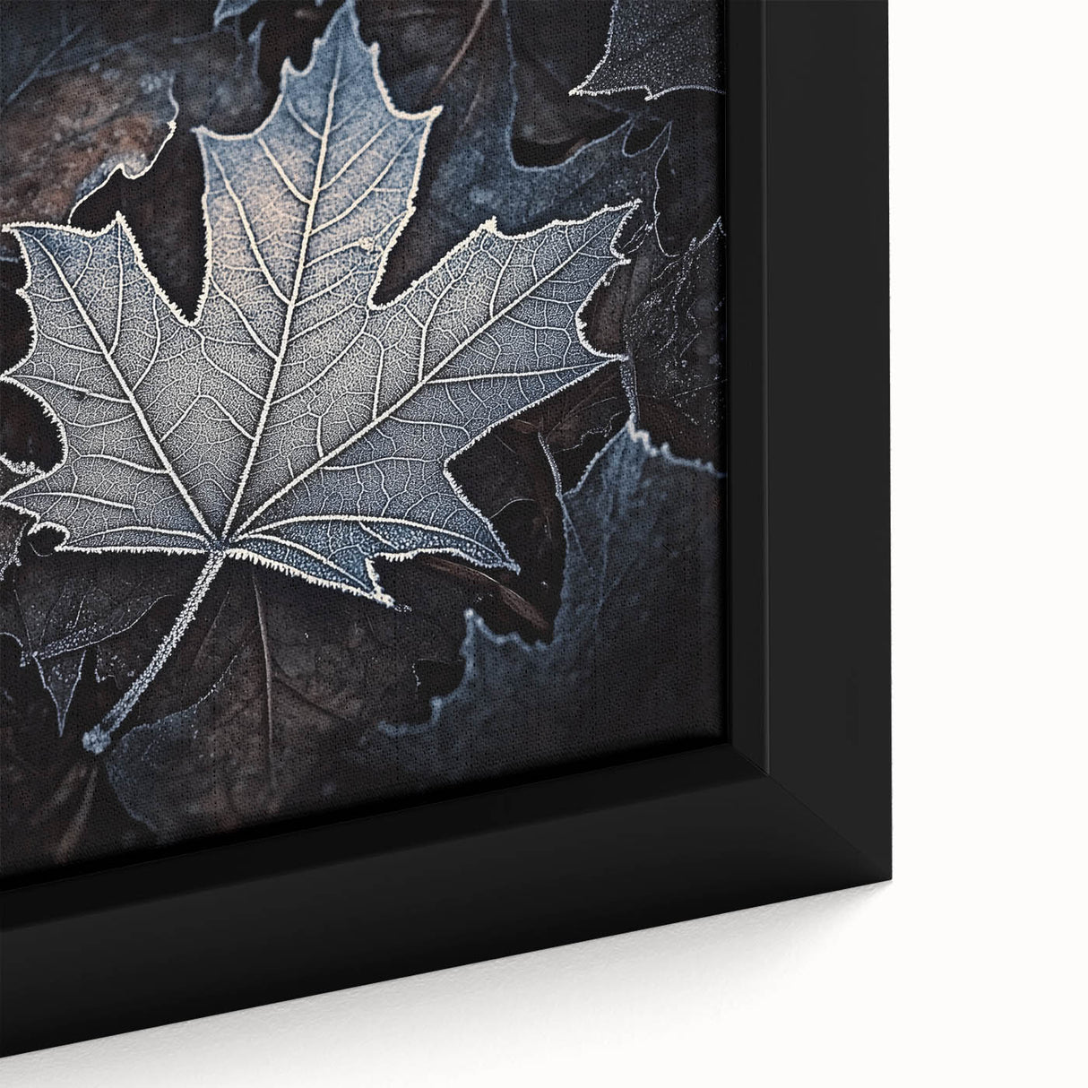 Close-up of textured leaves in black, framed canvas, ideal for living room decor.