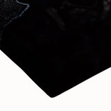 Close-up of leaves in black and white on a large stretched canvas, suitable for bedroom wall art.