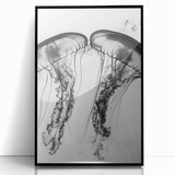 Large abstract wall art featuring close-up water imagery in muted blue tones on a framed acrylic.