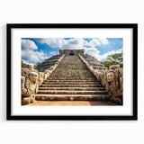 Colorful abstract art print of Yucatan scenery in vibrant hues, framed in black.