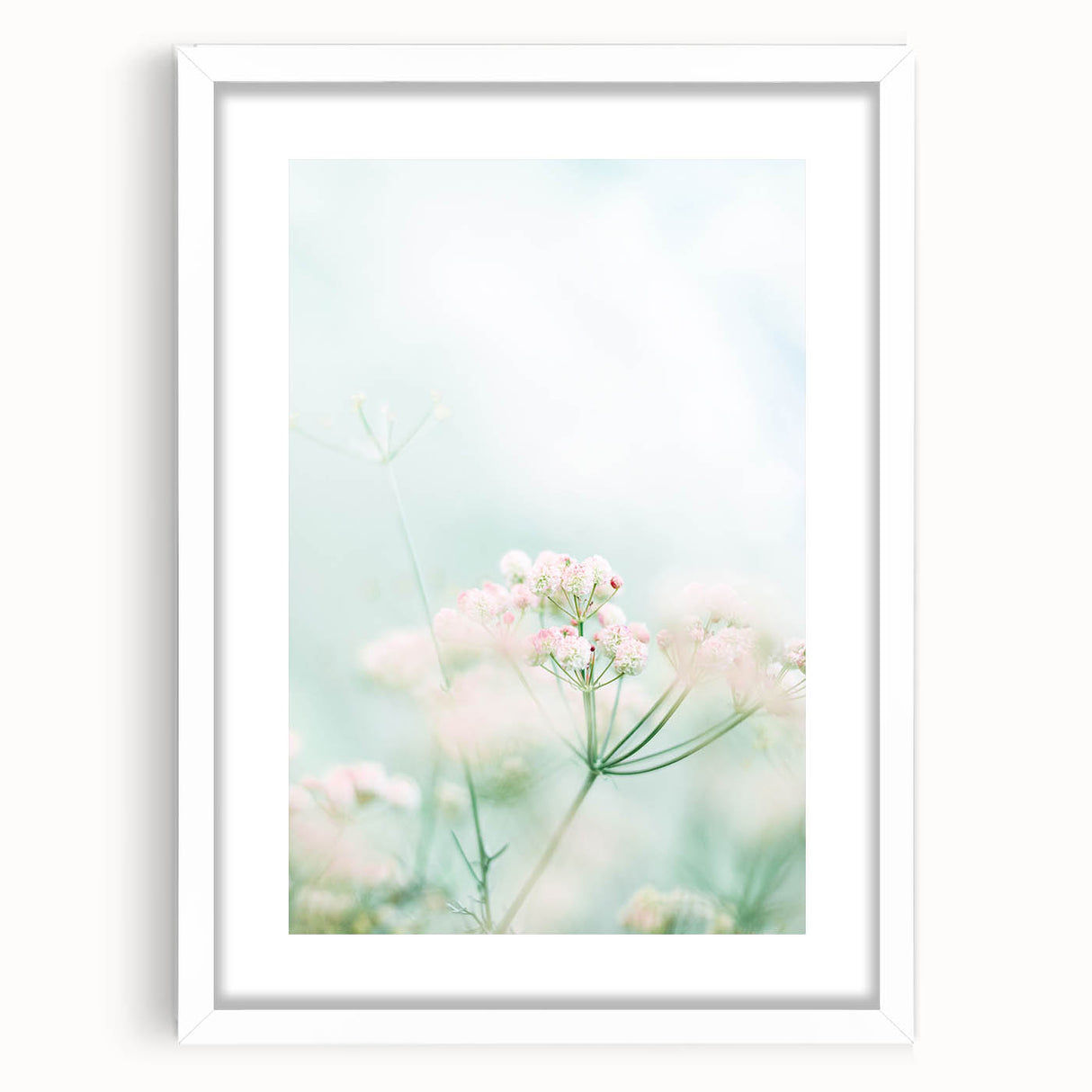 Abstract art print featuring vibrant spring colors on a white framed canvas, ideal for dining room or bedroom decor.