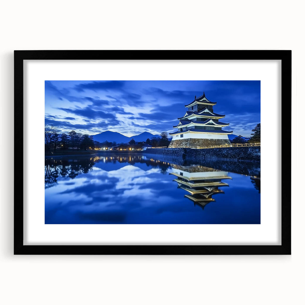 Elegant black-framed landscape artwork showcasing a majestic castle surrounded by lush greenery, ideal for enhancing home decor with a touch of sophistication.