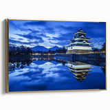 Framed canvas artwork showcasing a picturesque landscape with a majestic castle, gold frame accentuating the scene, ideal for elegant home décor.