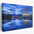 Stretched canvas artwork depicting a scenic landscape with a majestic castle, showcasing vibrant colors and intricate details, ideal for home decor.