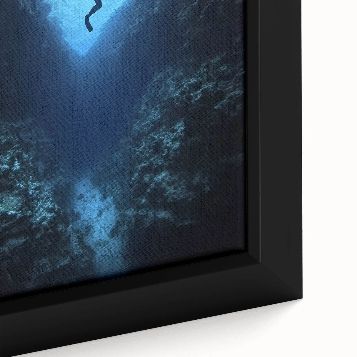 Close-up of a framed canvas artwork depicting intricate cave landscapes, showcasing detailed textures in earthy tones, perfect for modern home decor.